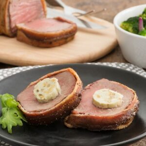 Peppered Bacon-Wrapped Beef Tenderloin with Blue Cheese Compound Butter