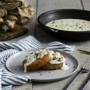 Pork Chops with Creamy White Wine and Mushroom Sauce 760x507 1 e1750342500969